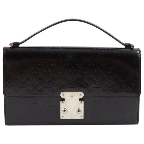 louis vuitton vintage black leather clutch|louis vuitton black embossed.